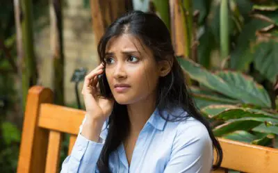 unhappy woman on phone